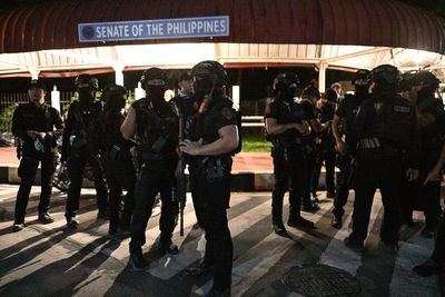 Gunshots fired in Philippines Senate as ex-police chief wanted over murder charges