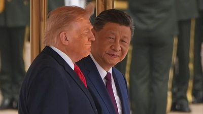 Xi Jinping vows to 'open door wider' to US firms during Trump visit