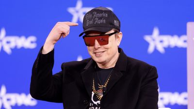 Elon Musk Mocked Online As 'Little Blogger' After Being Caught Filming Himself at China Summit Event