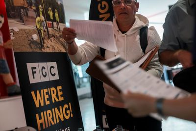 US filings for jobless benefits rise as economists call the market ‘low-hire, low-fire’