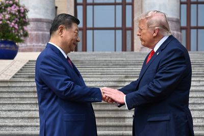 Five taps and no yank: What Trump and Xi’s ‘power-play’ handshake reveals about the world leaders