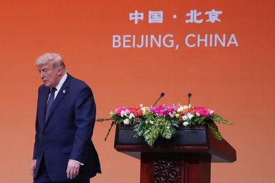Trump manages to avoid points of contention during banquet hall speech in China