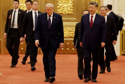 White House aide trampled by Chinese journalists during Xi meeting