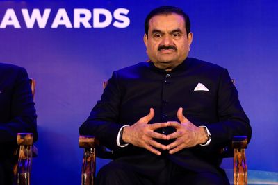 US agrees to settle lawsuit that accused an Indian billionaire of hiding an alleged bribery scheme