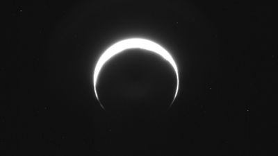 No, this isn't a solar eclipse. It's an image of Mars, captured by NASA's asteroid-bound Psyche probe
