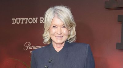 Martha Stewart elevates her straight-leg jeans and sharp blazer with espadrille wedges for a summery finishing touch