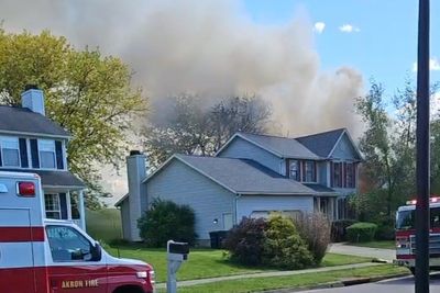 Two dead after small plane crashes into Ohio home, engulfing it in flames