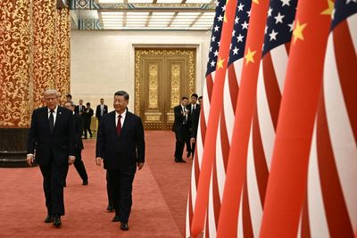 Trump demands a ballroom like China in Truth Social tirade from Air Force One after lavish reception in Beijing