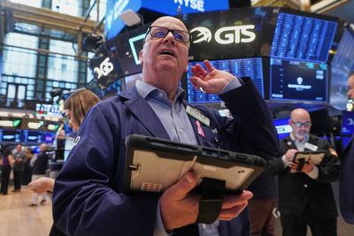 US stocks slide from record highs as oil surges and bond yields jump on Iran war fears
