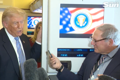 Trump lambasts reporter inches from his face on flight from China and calls him ‘treasonous’ over Iran question