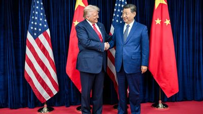 ‘We have to go!’: Donald Trump smiled for cameras all day in China ….while American staff were being trampled, blocked, and locked in rooms