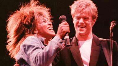 “I saw this big mane of hair coming down the hallway. I could hear her saying, ‘Where is he?’ Someone said, ‘There he is.’ And Tina says, ‘Bryan, I loooove this song! I wanna record it!’”: When Bryan Adams and Tina Turner created an all-time great duet