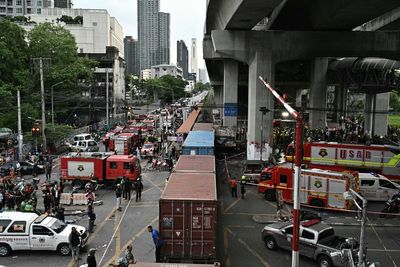 At least eight dead as cargo train hits public bus at rail crossing in Thailand’s capital