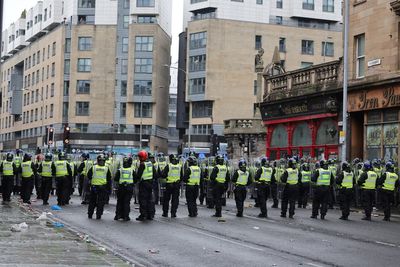 Police officers injured during ‘serious disorder’ after Celtic’s title win