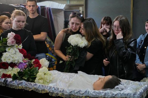 Young Kyiv couple killed in a fierce Russian airstrike hoped to start a family, mourners say