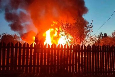 Ukrainian drone strikes on Russia kill 4 and wound 12 others, while debris lands on a Moscow airport