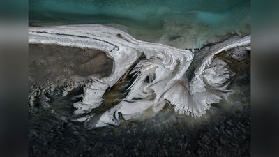 This thought-provoking aerial photography documents humanity’s insatiable appetite for natural resources