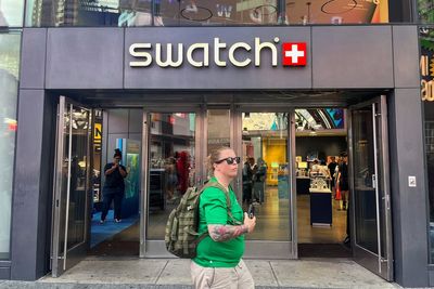 Swatch stores in UK shut as crowds gather to snap up new watch