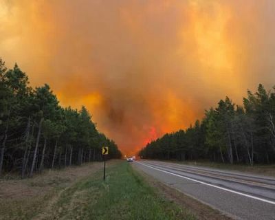 Minnesota deploys national guard to help fight wildfires in northern region