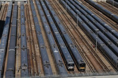 With largest US commuter rail system shut down, federal labor officials urge unions to resume talks