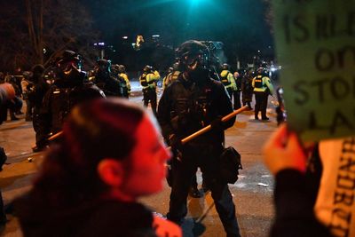 ICE officer charged over shooting of Venezuelan man in Minnesota