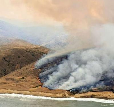 California island fire linked to sailor’s distress flare scorches 10,000 acres