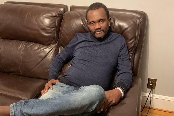Autopsy says the death of a Haitian man detained in Arizona was related to his dental woes