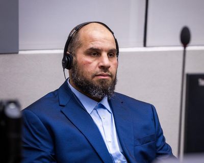‘Huge milestone’ as Libyan militia commander accused of torture appears at ICC