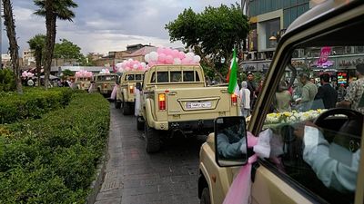 Tehran mass wedding turns military vehicles into bridal cars