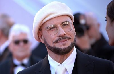 John Travolta reveals secret meaning behind viral beret look at Cannes