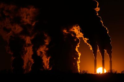 Climate report says world won't get as hot as feared but will pass warming limit