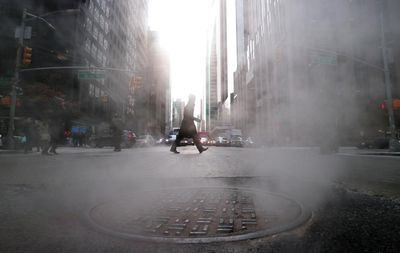 New York woman dies after stepping out of car into open manhole