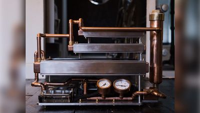 Custom-built passive water-cooled PC relies on convection chimney effect powered by triple-stacked radiators — 9800X3D build with RTX 5080 has no fans, copper, and radiator chimney, but struggles to keep temperatures down