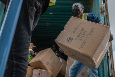 Risk of Ebola spread is high locally but low globally, WHO says