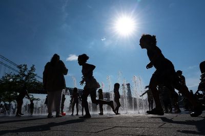 Texas storms prompt canceled flights as north-east heatwave comes to a close