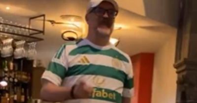 WATCH Hearts-daft pundit take to the stage in full Celtic kit as he honours bet