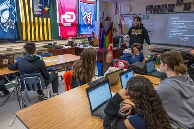 RFK tells schools to cut back on screen time and go back to old textbooks as Trump touts AI for education