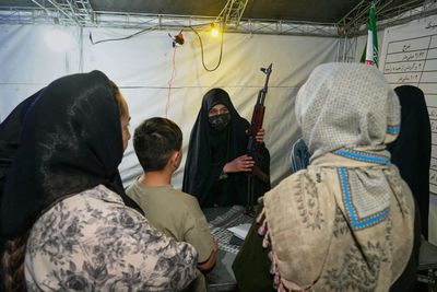 In Iran's capital, weapons demonstrations send a signal at home and abroad as threat of war remains