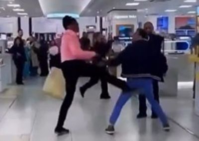 Moment brawl breaks out on Selfridges shop floor as terrified shoppers watch
