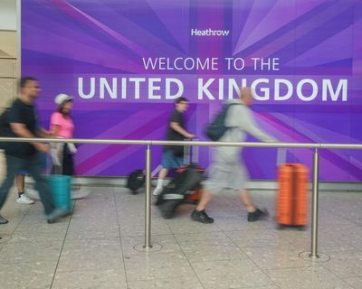 Net migration to UK falls by nearly 50% after Labour’s vow to cut numbers