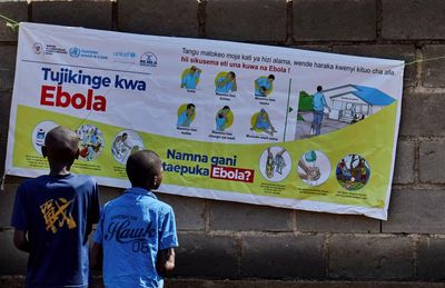 US is ‘simply choosing not to stop’ Ebola outbreak after massive public health cuts, experts say