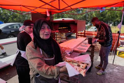 A displaced Lebanese grandmother feeds thousands of compatriots who fled war