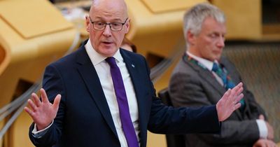 John Swinney stands by 'move on from Troubles' remark in face of Holyrood protest