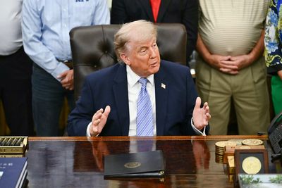 Man’s belly button next to Trump during Oval Office announcement steals the show on social media