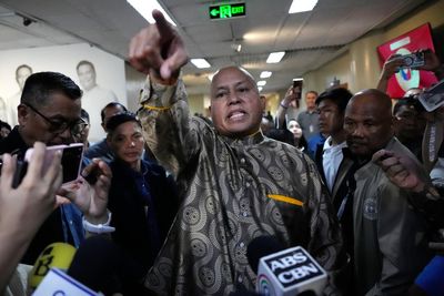 A pursuit in the senate, gunfire, now on the run: why is a former Philippines police chief in hiding?