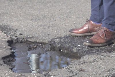 Britain’s pothole-ravaged streets stopping older people from exercising, MPs say