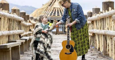 New crannog unveiled on banks of Scottish loch after devastating fire