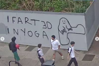 CCTV: Suspect sprays bizarre graffiti message on London wall