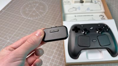 You need to know the Steam Controller's charging puck is always live, so if you accidentally touch it with something conductive, you're in for a shock