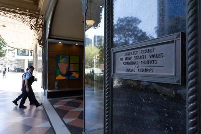 Police drop case against artist who depicted high-profile Australians in uniforms with Nazi symbols